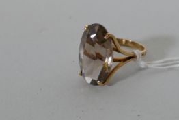 A vintage 14ct yellow gold dress ring set with a large topaz gemstone, Israeli hallmark, 5.8g gross,