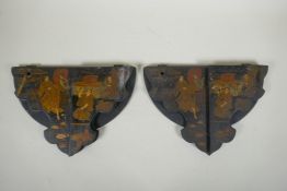A pair of Japanese export Japanned papier mache folding brackets, decorated with geisha and their