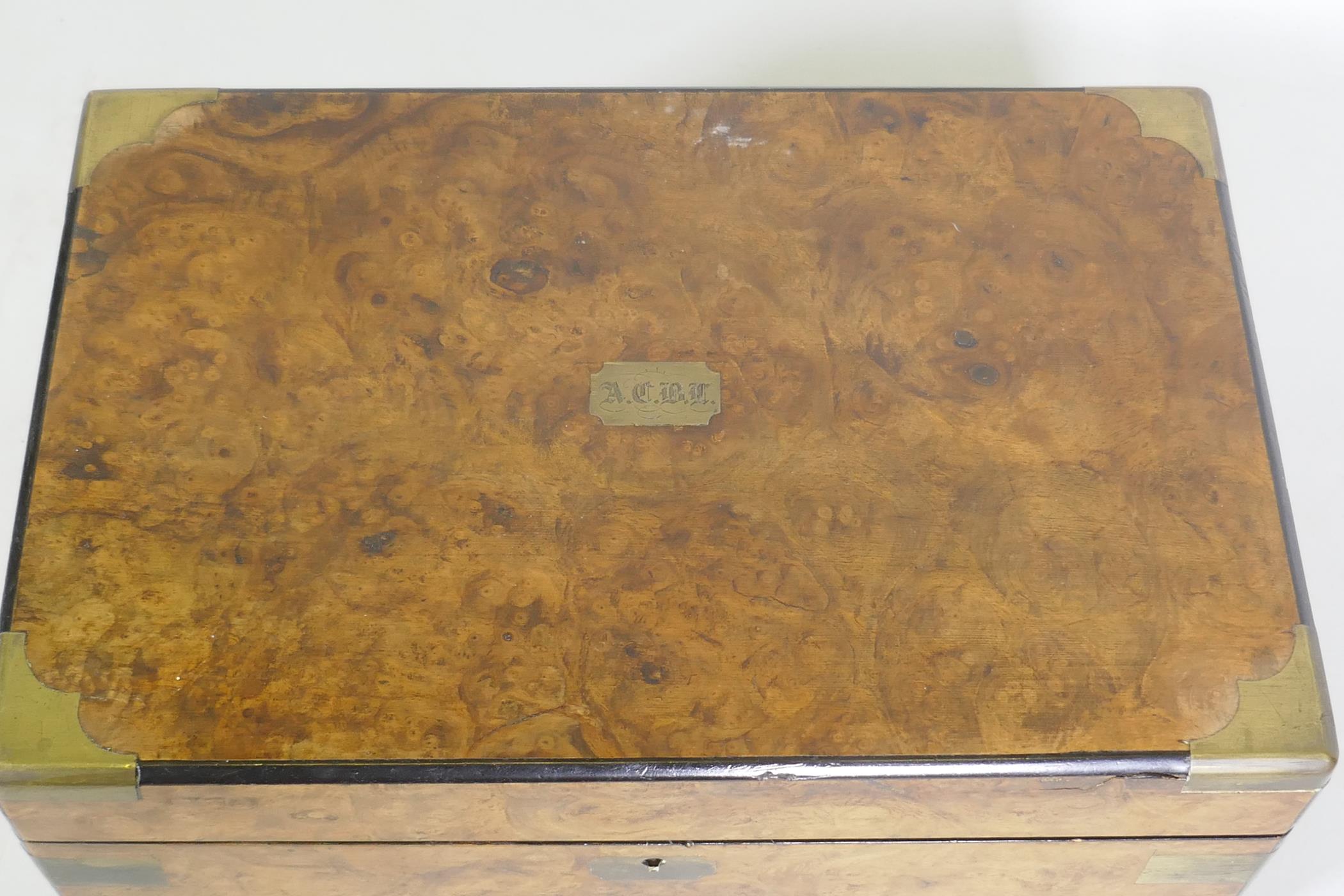 A Victorian burr walnut writing slope with brass mounts and fitted interior with inset leather slope - Image 2 of 4
