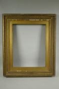 A late C19th/early C20th Watts type picture frame, 36 x 46cm rebate