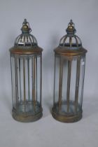 A pair of large coppered metal lanterns, 86cm high