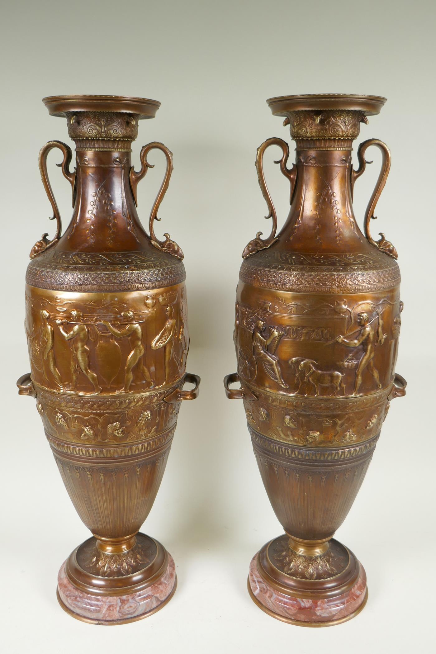 After Barbedienne, a pair of bronze Grand Tour style urns with two handles and raised figural - Image 5 of 9