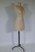A vintage French adjustable tailor's dummy, 146cm high