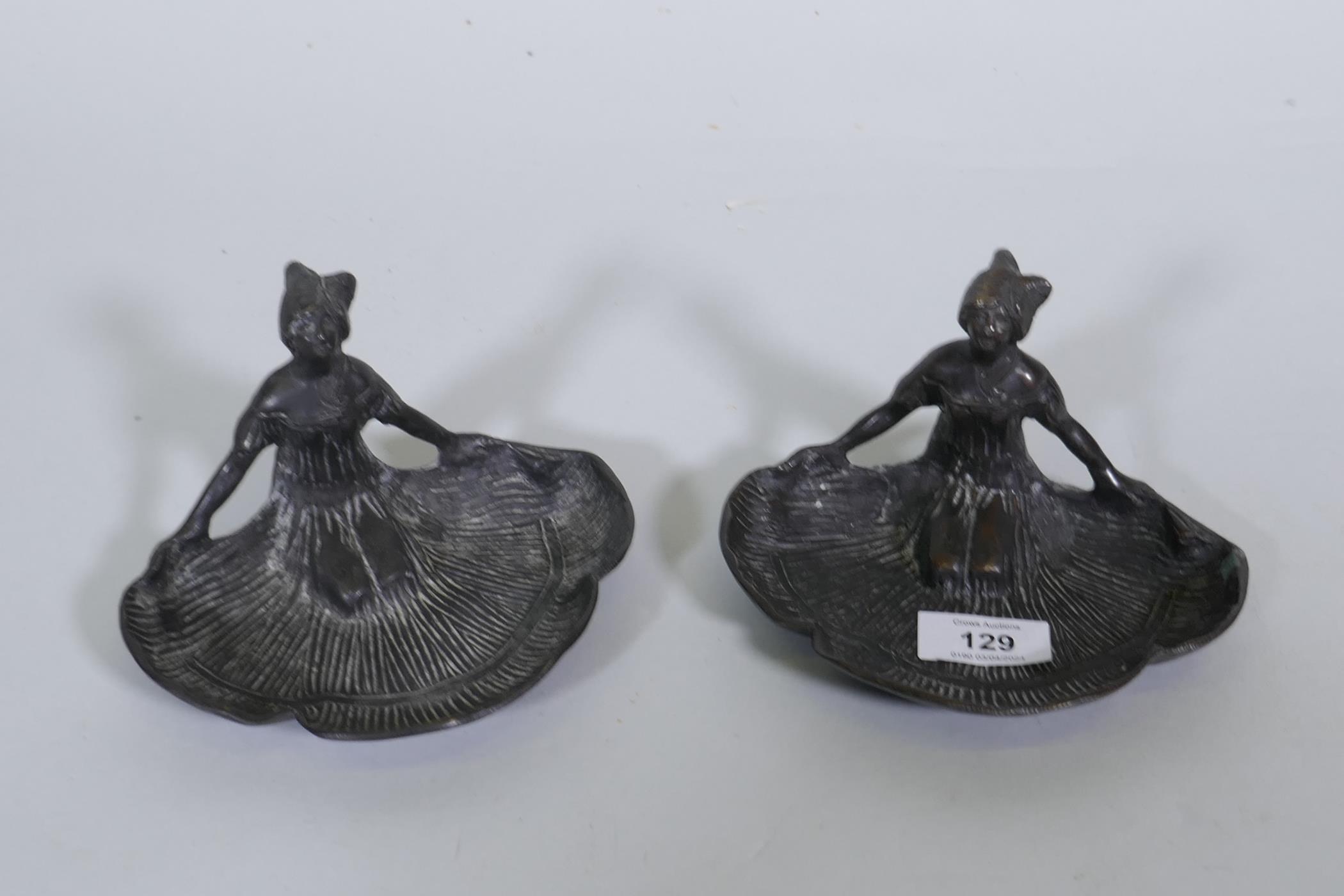 A pair of bronze dishes in the form of kneeling women with fanned skirts, 10cm high - Image 2 of 2