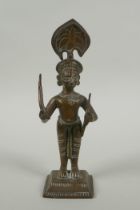 An antique Indian bronze figure, with bow and short sword/septre, 19cm high