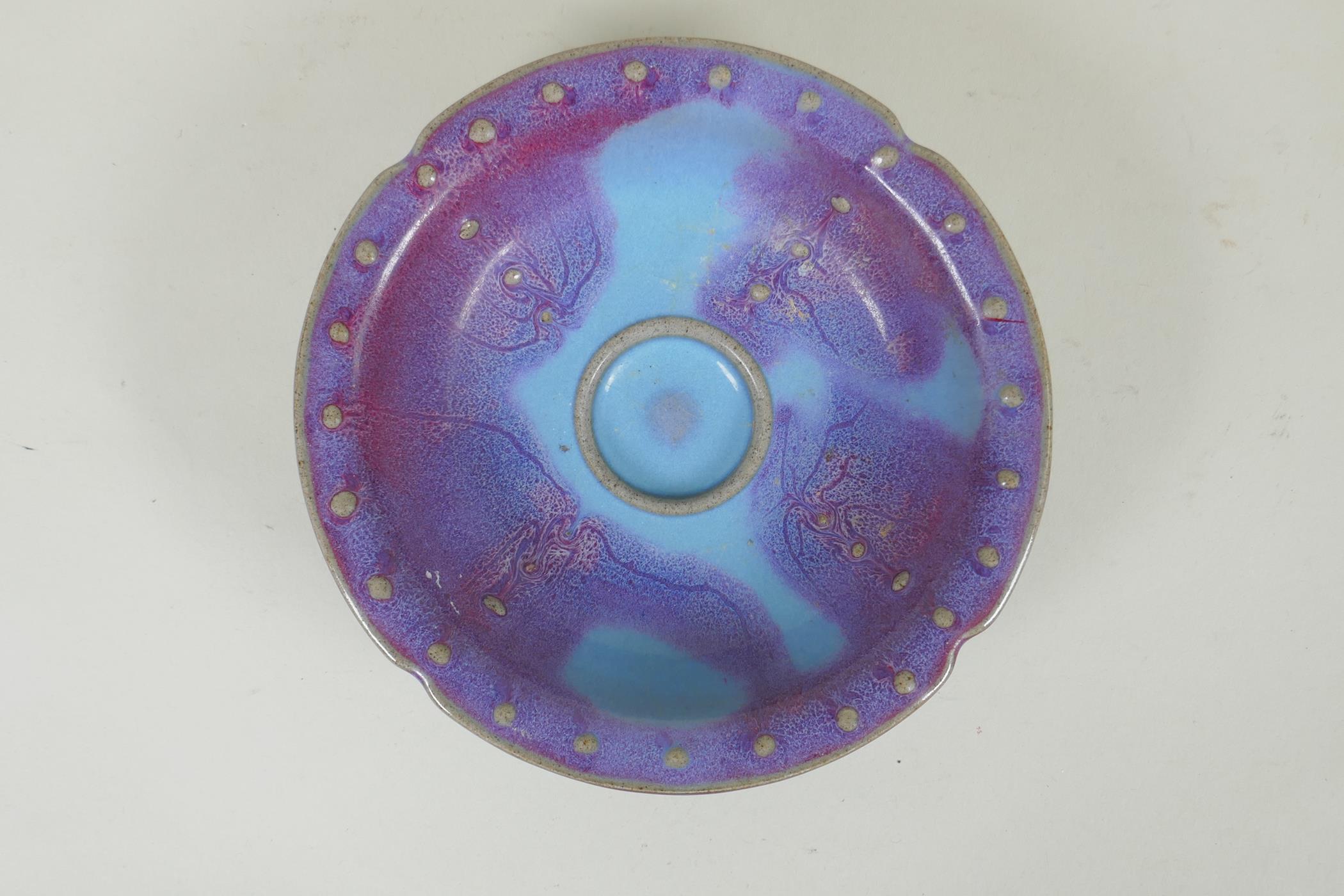 A Chinese Jun ware dish with lobed rim, 18cm diameter