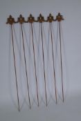 A set of six cast iron gothic style plant stakes, 106cm long