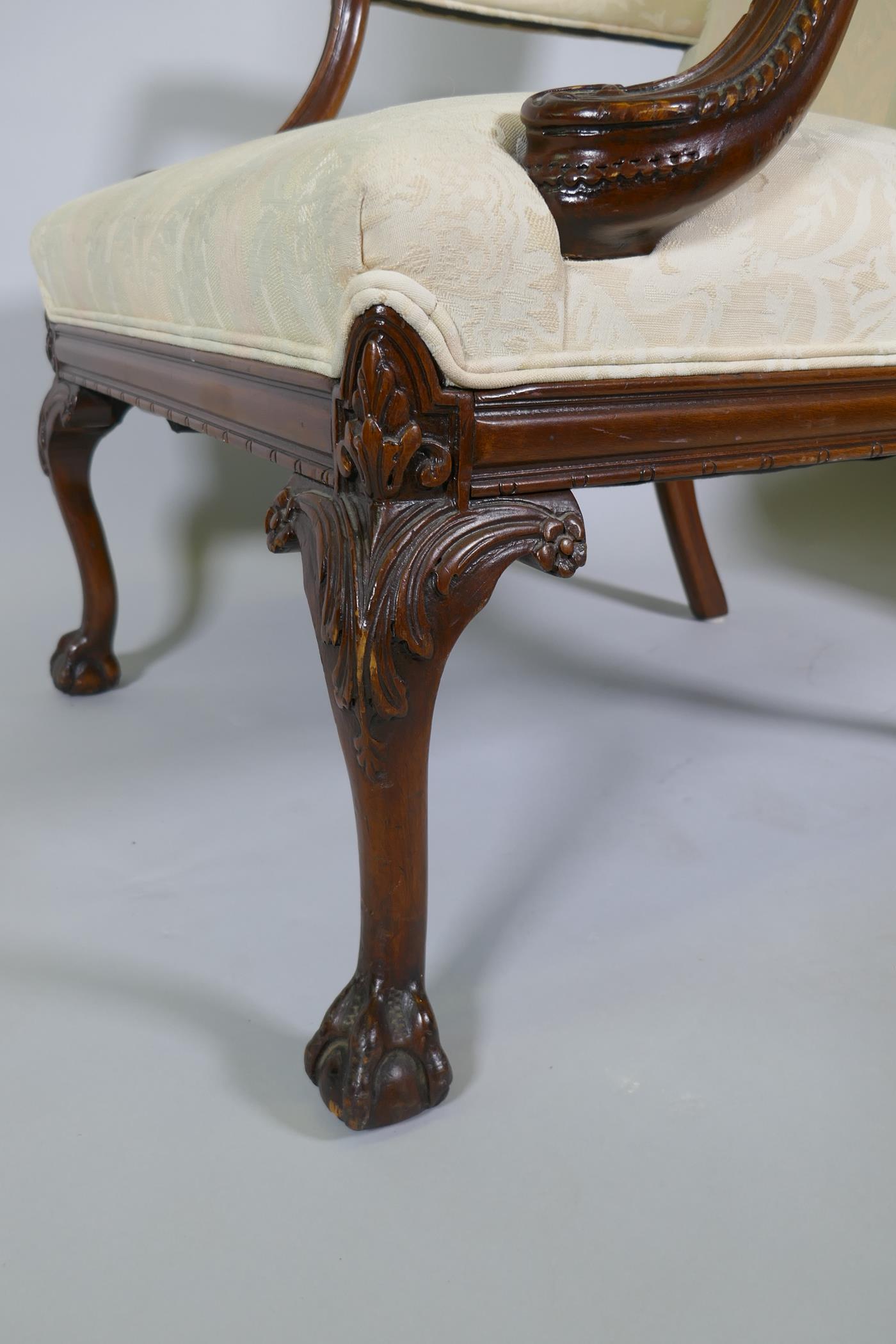 A pr of C18th style Gainsborough chairs with carved decoration and hump backs, raised on cabriole - Image 4 of 5