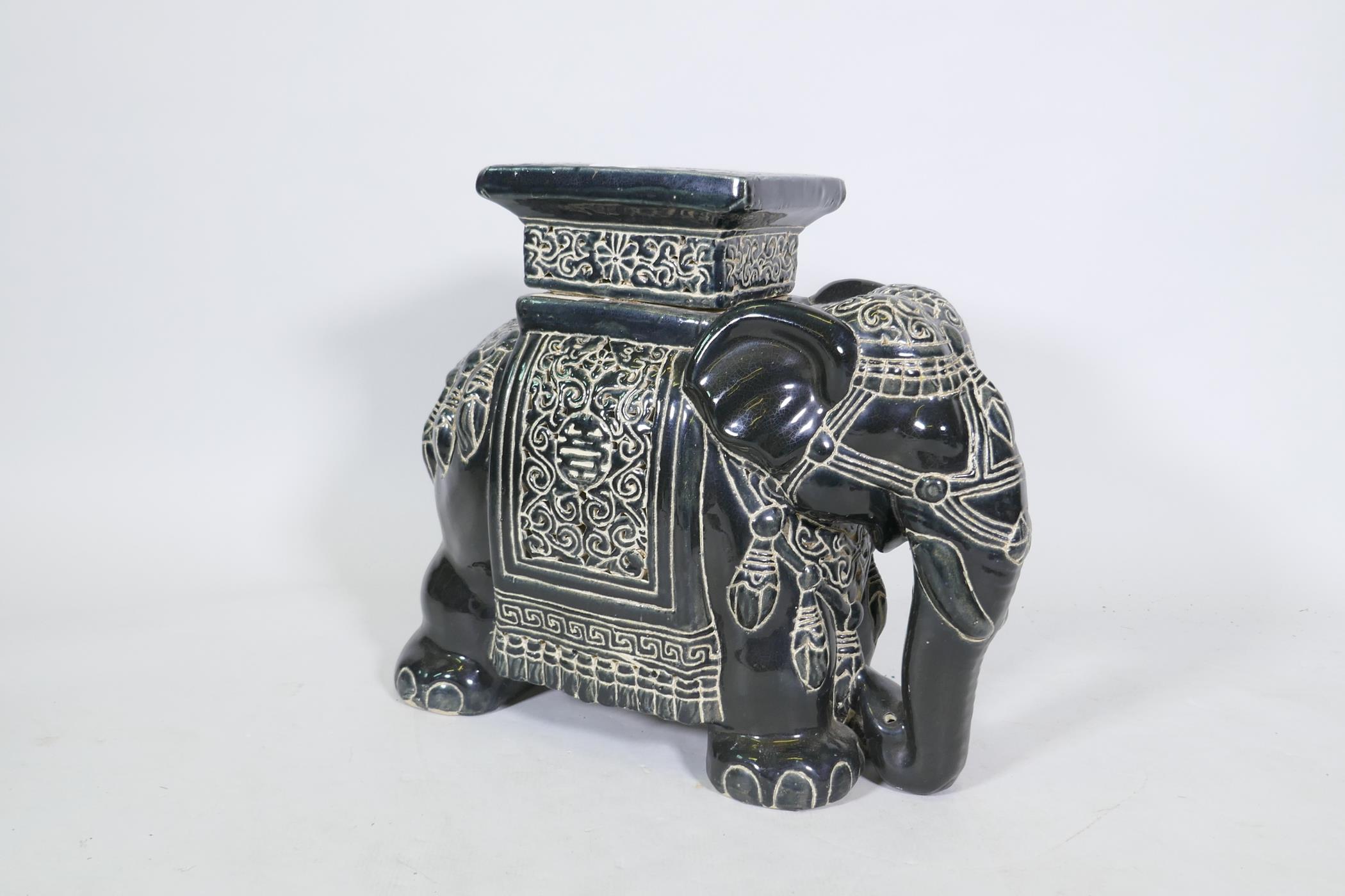 A ceramic garden stool in the form of an elephant, 45cm high