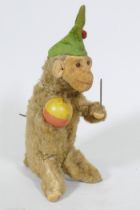 A vintage clockwork monkey, 25cm high