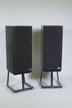 A pair of B & W (Bowers & Wilkens) DM220i loud speakers, 10w-100w, on Target Audio stands, 99cm high