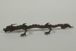 A Japanese style bronze okimono dragon, 16cm high