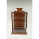 A mahogany desk top display cabinet, and a smaller display case, largest 31 x 29cm, 50cm high