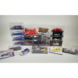 Twenty four 1:43 scale die cast model cars by various manufacturers including Auto Art, Spark,