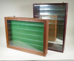 A bespoke hanging display cabinet with baize back, and another similar with mirror back, largest