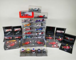Twenty two 1:43 scale die cast model Formula 1 cars, to include eleven from Formula 1, The Car