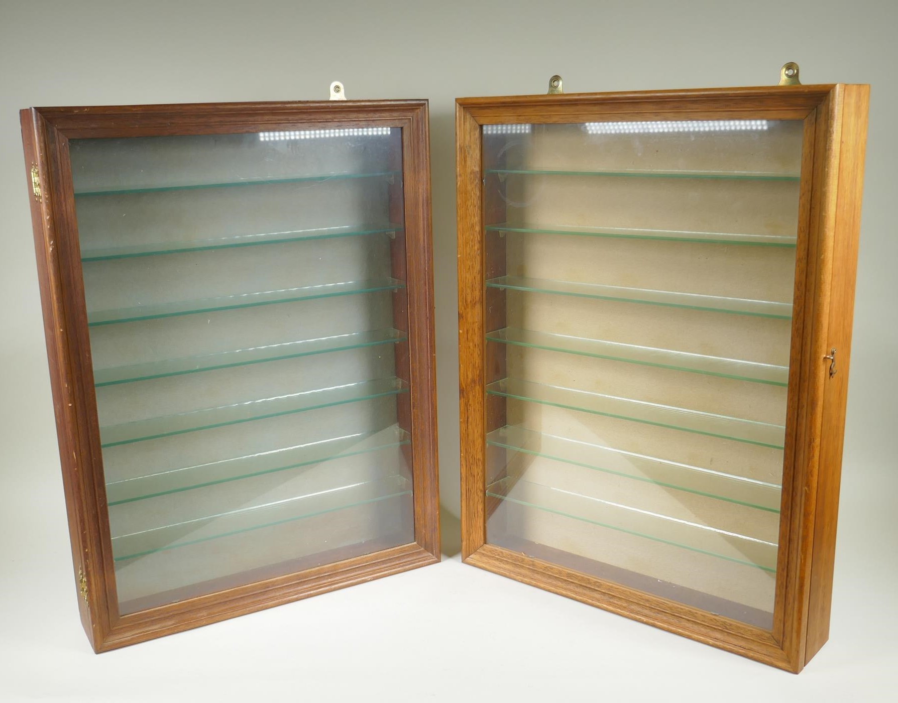 A pair of bespoke hanging display cabinets with baize back, 46 x 61cm