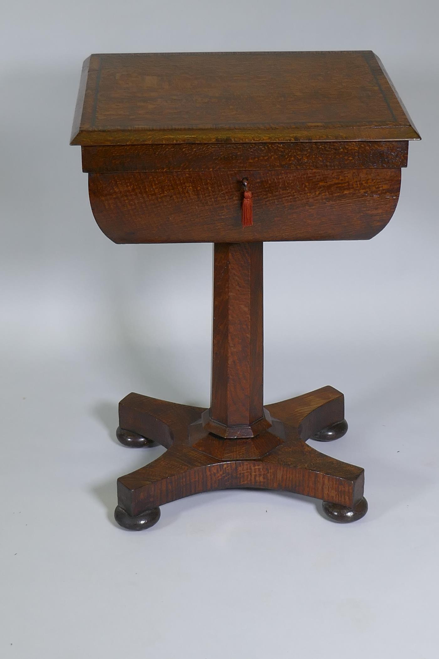 A Victorian oak workbox, the lift up top with fitted interior, raised on a tapering column and - Image 2 of 9