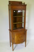 A Victorian inlaid mahogany bow front display cabinet raised on tapering supports, 67 x 45cm,