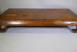 An antique Chinese hardwood low/opium table, 190 x 84cm