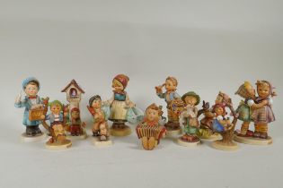 Eleven vintage Goebel porcelain figures