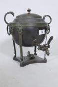 A C19th Empire style bronze samovar/water cistern with Egyptian motifs and sphinx decoration, 26cm