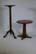 A Victorian mahogany torchere/jardiniere stand, raised on a fluted column with carved cabriole