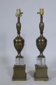 A pair of bronzed and crystal glass table lamps, 63cm high