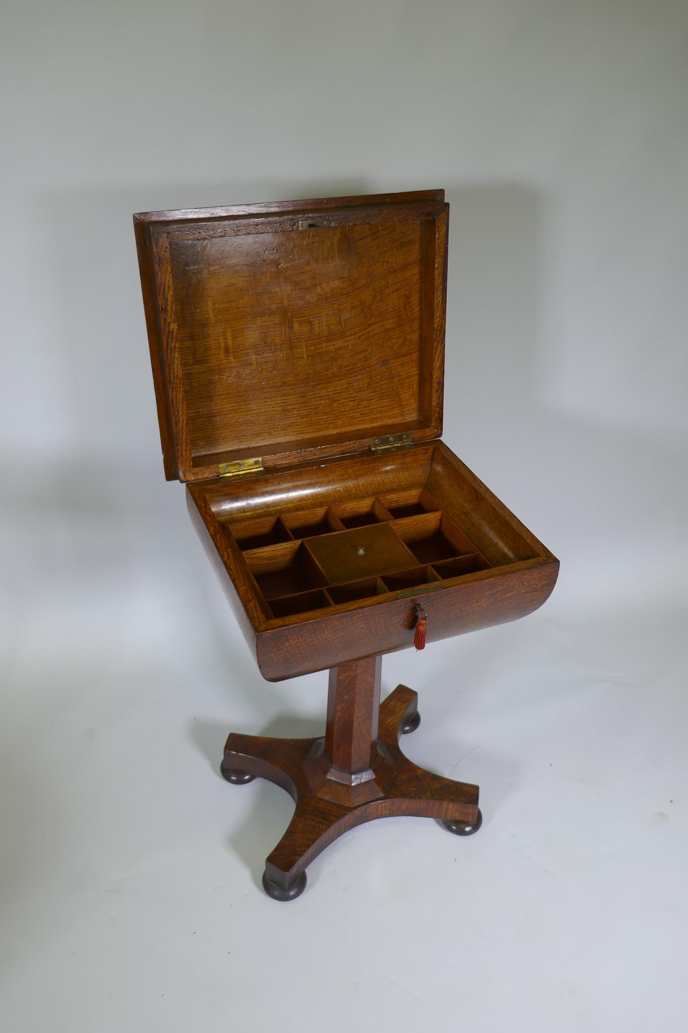 A Victorian oak workbox, the lift up top with fitted interior, raised on a tapering column and - Image 5 of 9