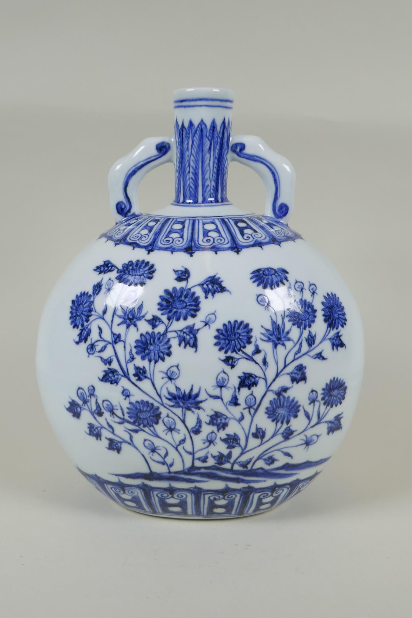 A Chinese blue and white porcelain moon flask with two handles and floral decoration, 4 character - Image 3 of 4