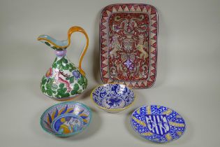 A quantity of Deruta and other majolica pottery to include a jug, two bowls, serving dish and