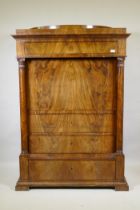 A C19th Danish figured mahogany secrétaire à abattant,  in two sections, the top drawer over a