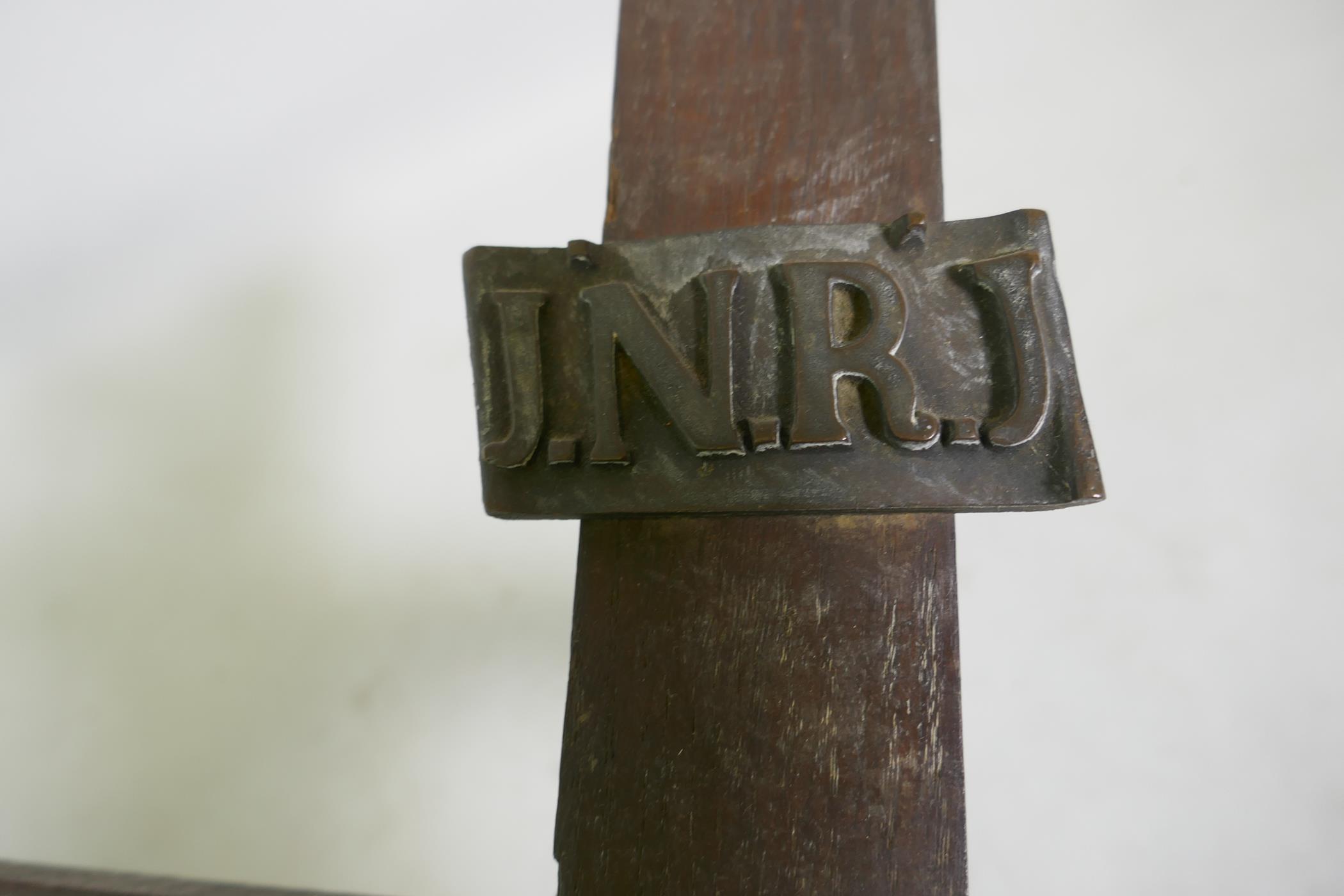 A C19th Continental bronze Corpus Christi, mounted on an oak crucifix with tablet, marked AA, - Image 6 of 6