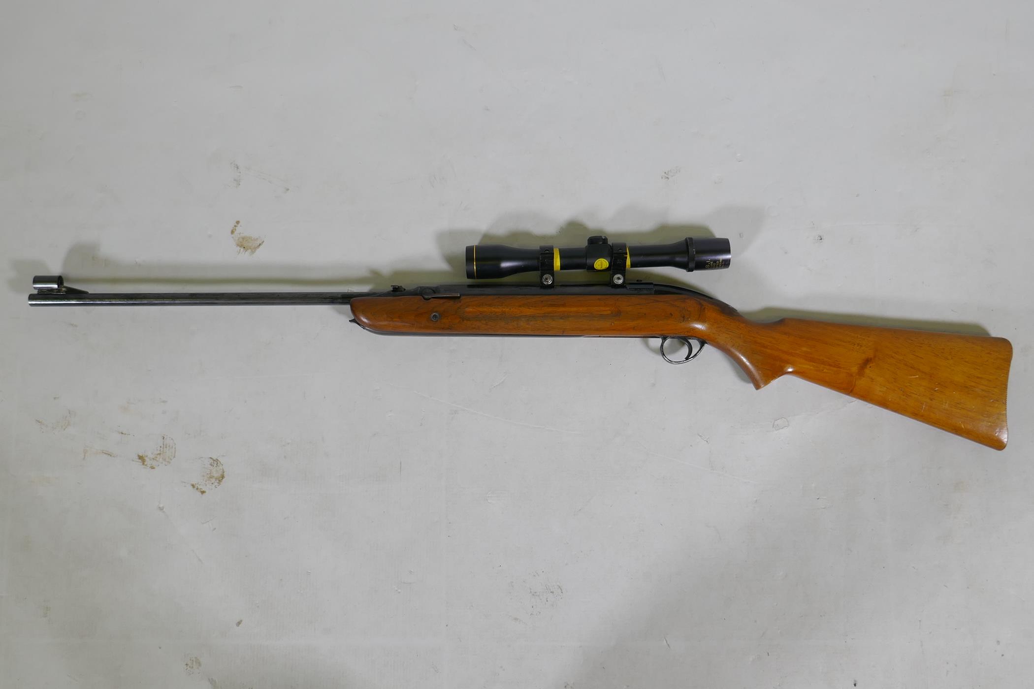 A BSA Airsporter underlever air rifle with an ASI scope, serial no. GD2343E