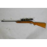 A BSA Airsporter underlever air rifle with an ASI scope, serial no. GD2343E