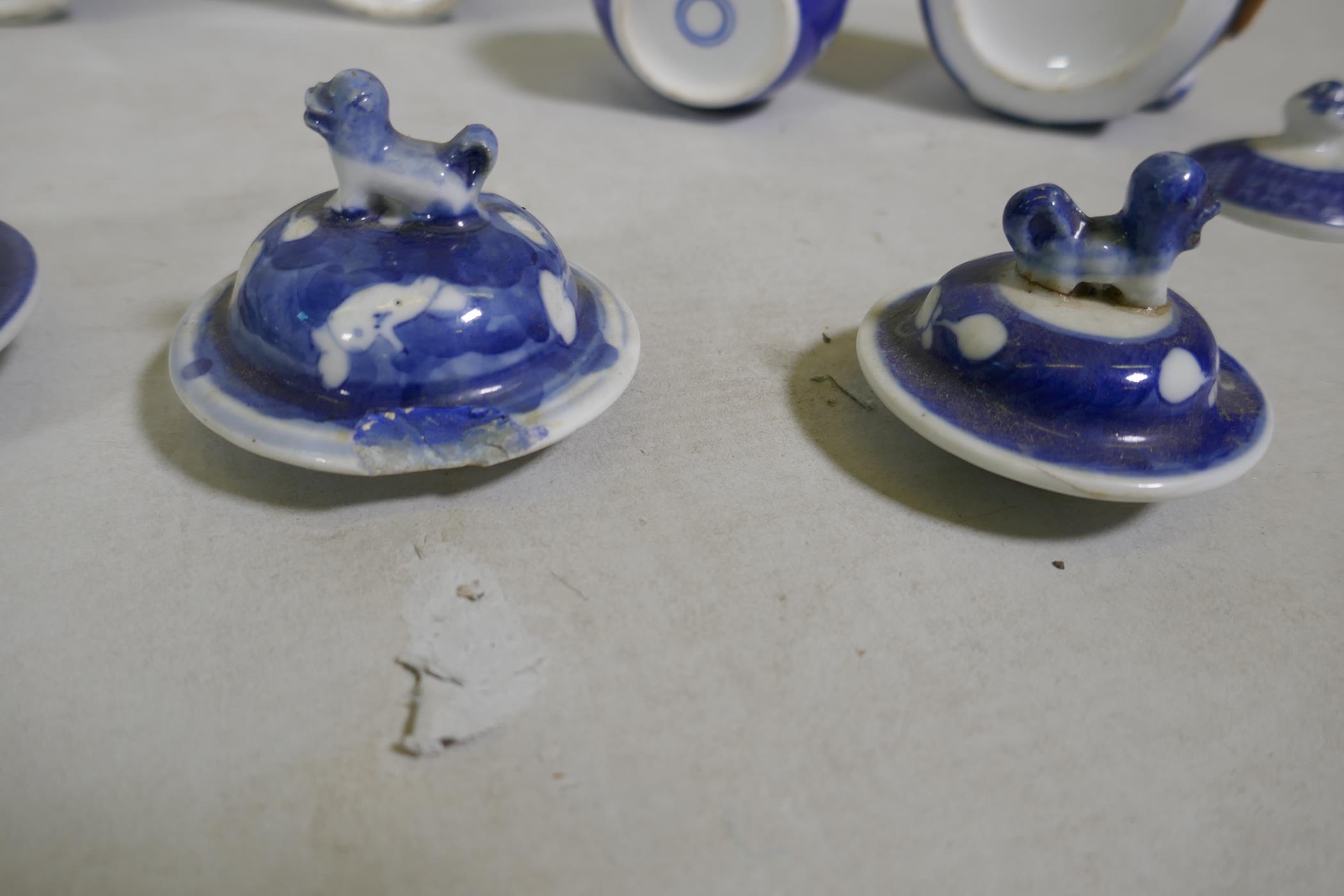 A collection of C19th Chinese blue and white vases with prunus on cracked ice decoration, mismatched - Image 6 of 6