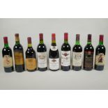 Nine 1980s bottles of red wine to include Bouchard Pere & Fils-Volnay Clos des Chenes Premier Cru