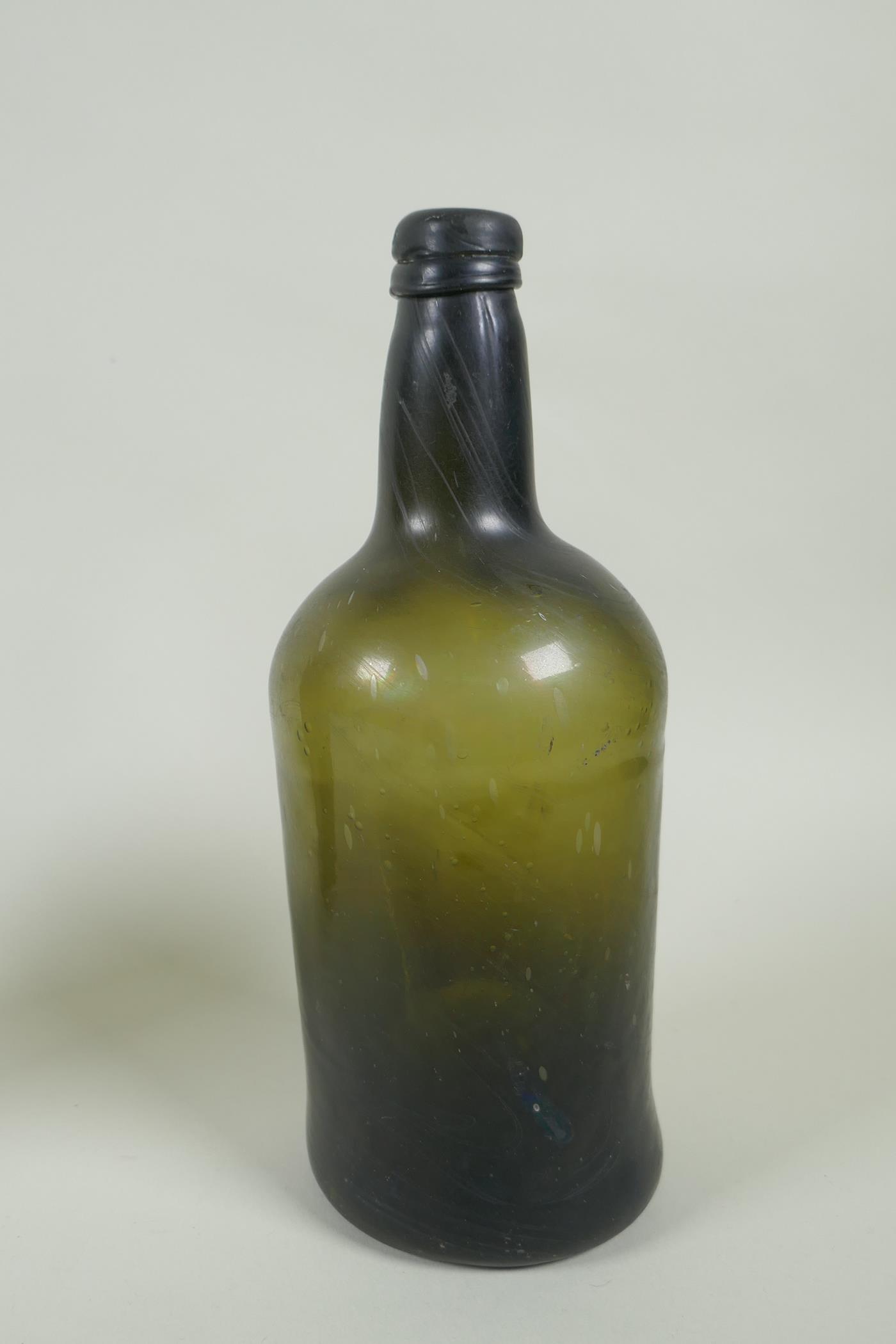 Three C19th green glass wine bottles, 26cm highest - Image 4 of 4