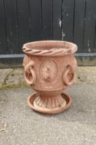 A C19th terracotta urn with four loop handles and lion mask decoration, 41cm high, 34cm diameter