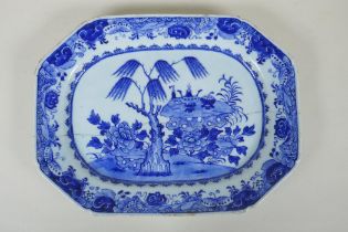 A C19th Chinese blue and white porcelain export ware dish, with historic pinned repairs, 36 x 27cm