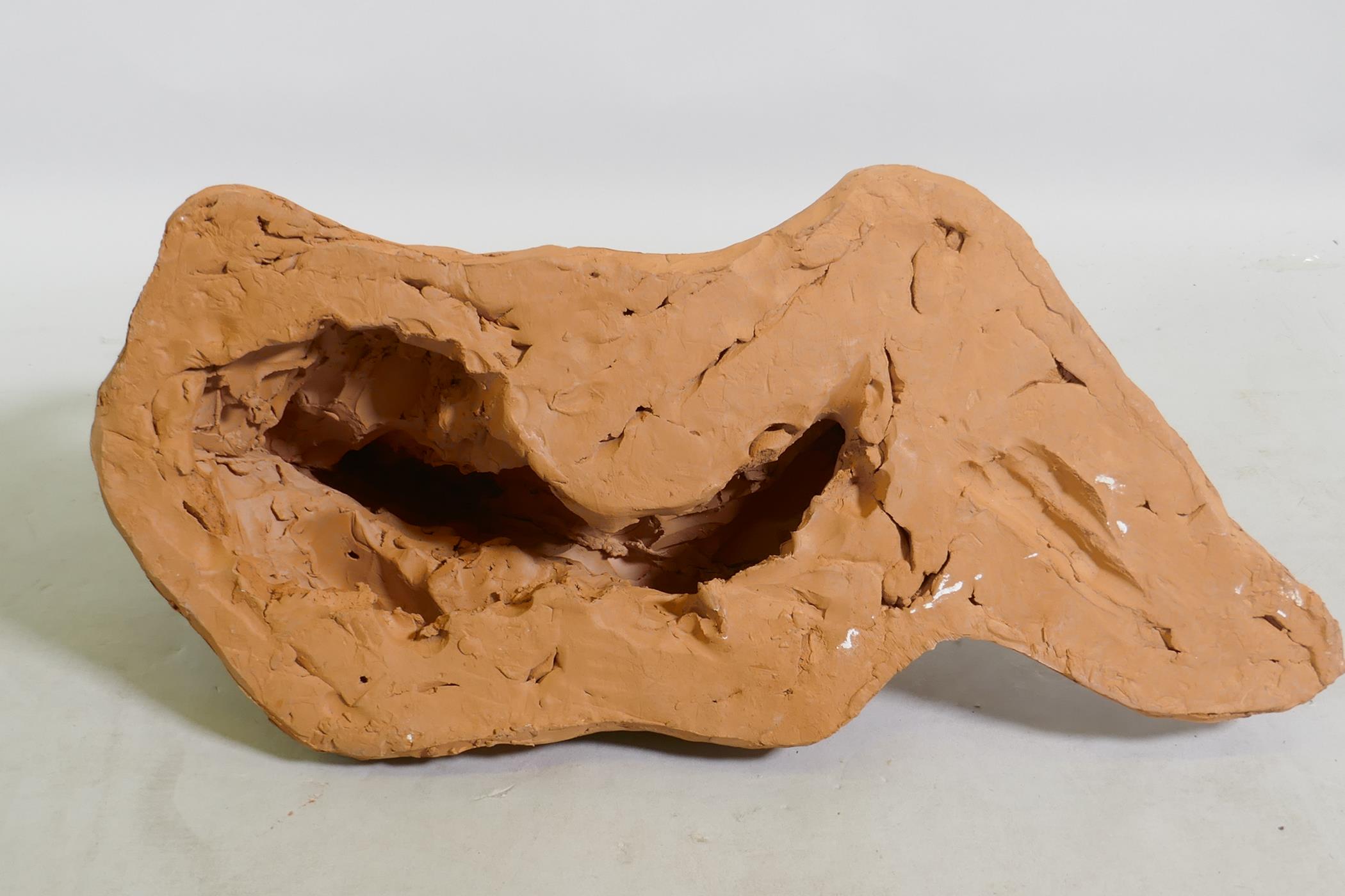 A terracotta sculpture of a reclining nude, inscribed MJ 94, 46 x 21cm - Image 4 of 4