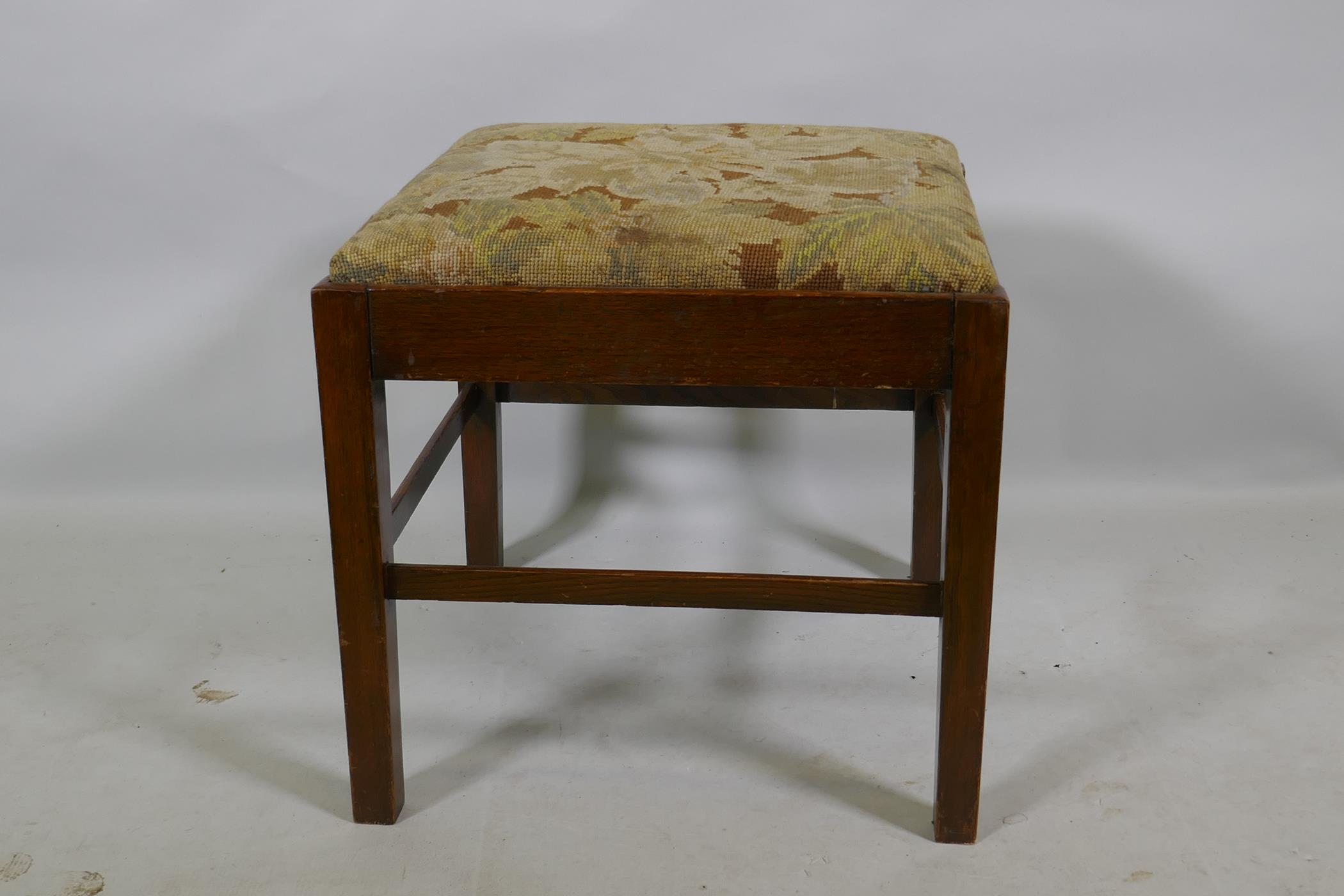 A C19th oak footstool with drop in tapestry seat, 45 x 45 x 45cm - Image 2 of 2