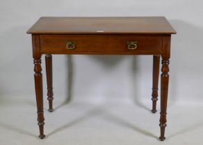 A Victorian mahogany single drawer side/writing table, raised on turned supports, 91 x 56 x 75cm