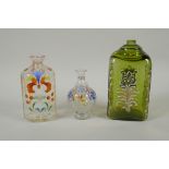 Two C18th/C19th enamelled Stiegel type glass bottles and a similar type perfume bottle, largest 18cm