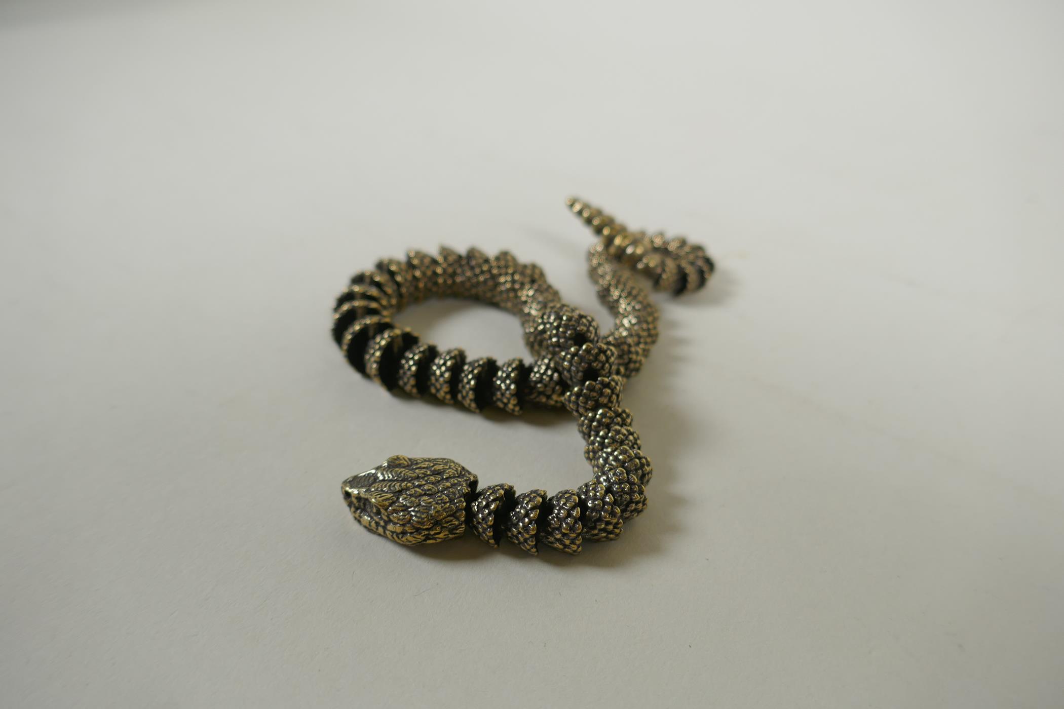 A Japanese Jizai style articulated polished bronze okimono snake, 40cm long - Image 5 of 6