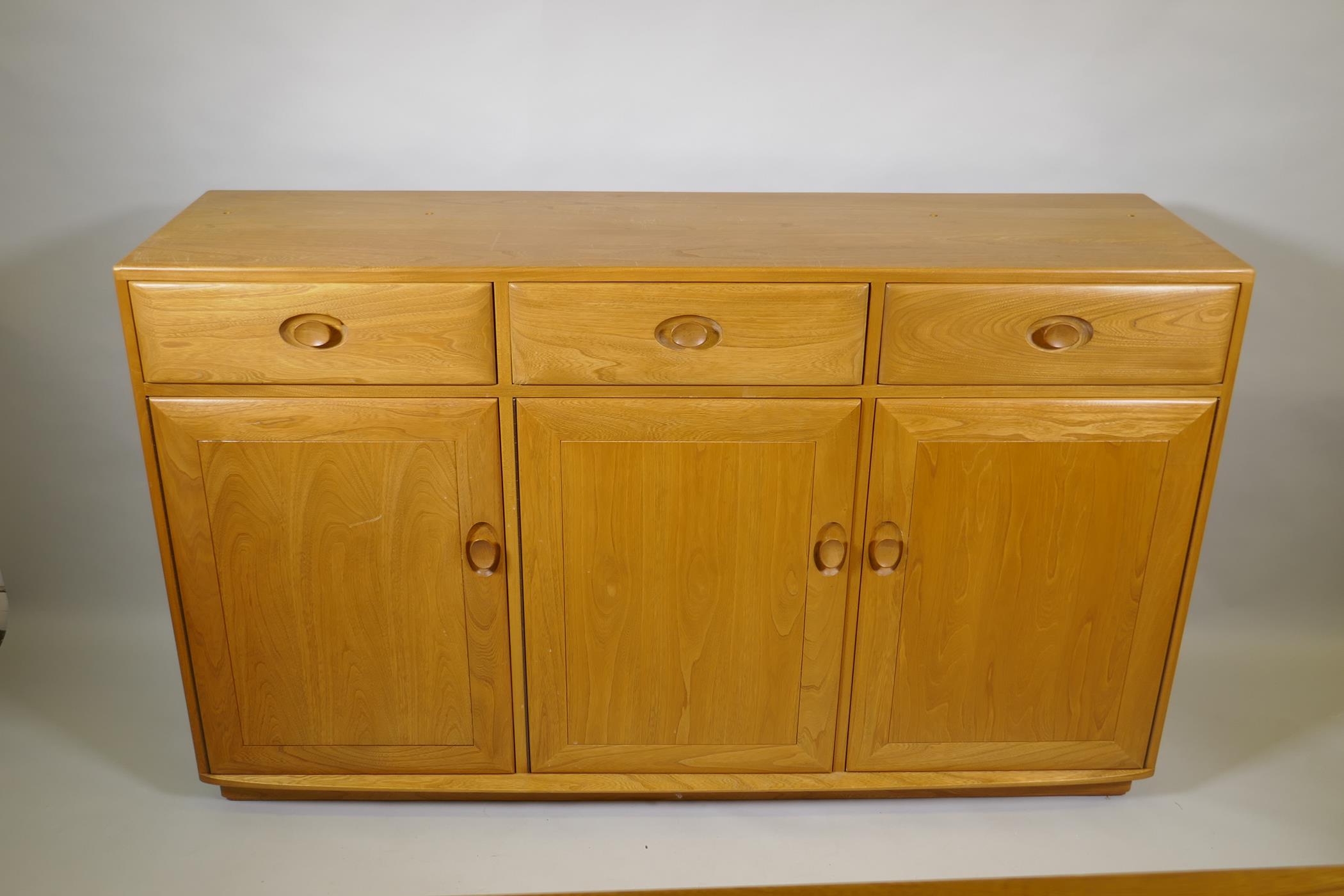An Ercol elm Windsor high sideboard with two glazed doors to the upper section, and three drawers - Image 4 of 4