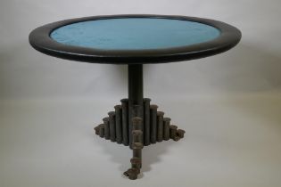 A custom games/poker table with welded steel base, 74cm high, 112cm diameter