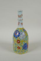 An antique Chinese polychrome porcelain mallet shaped bottle vase, with enamelled floral