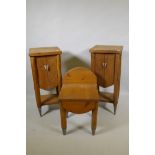 A pair of pine bedside cupboards and a pine stool, ensuite to the previous lot, with the same Paul
