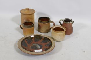 A collection of Mulchelney studio pottery, jugs, jars and mugs, largest 13cm high
